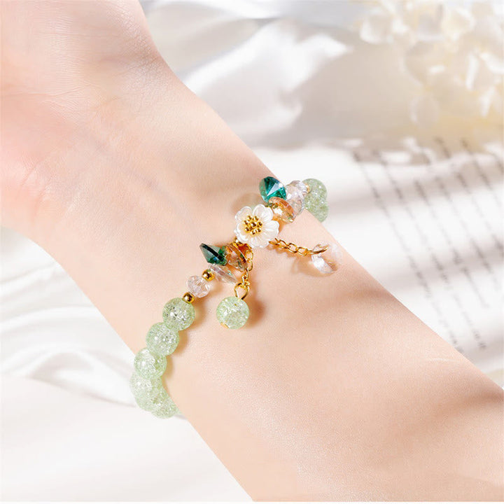 Armband Blume Glas grüne Perlen Blüte Naturstein elegant Handgelenk