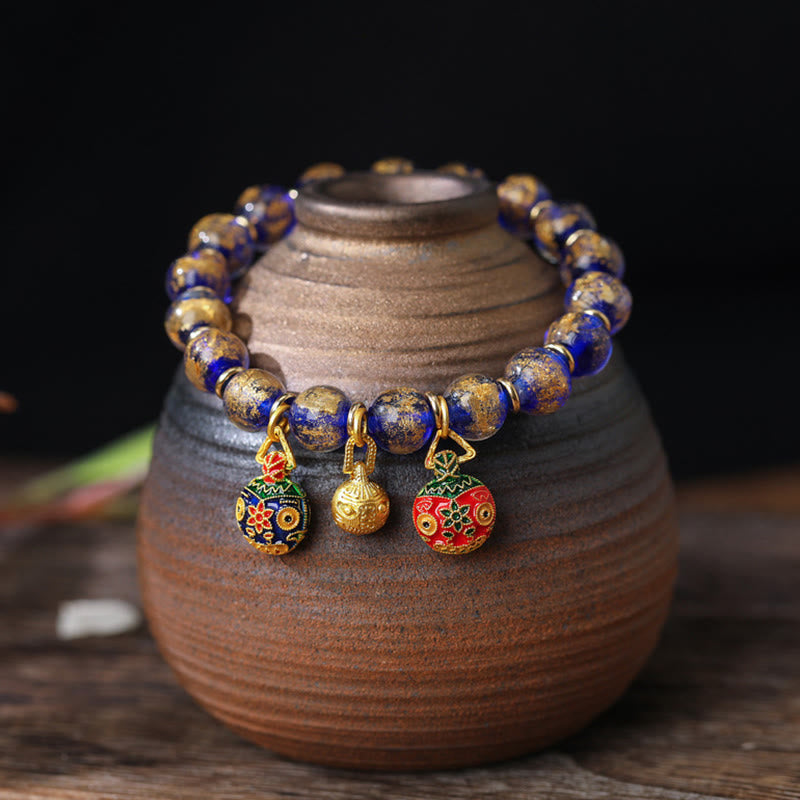 Lapislazuli Armband Silber – Segen mit vergoldeten Charms elegant.