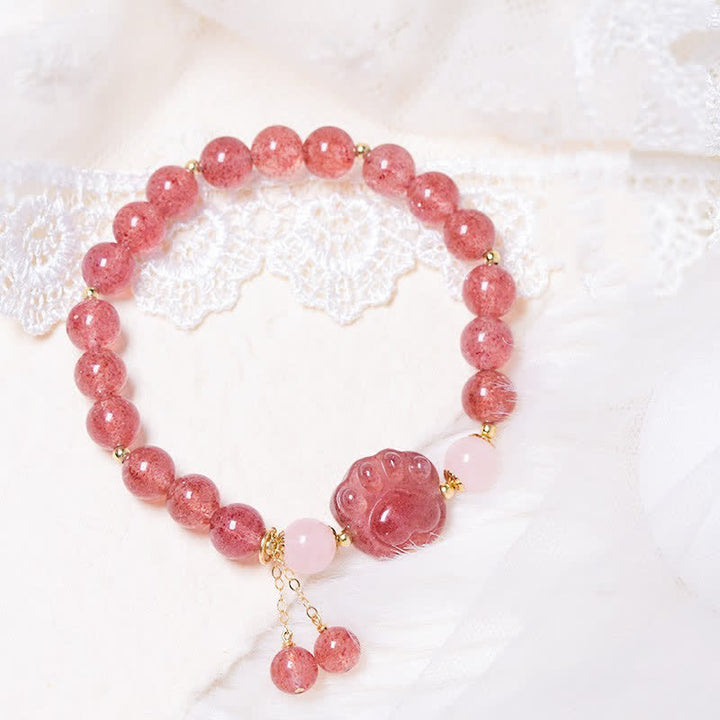 Armband Erdbeerquarz Kristall Katze rosa Perlen Naturstein elastisch.