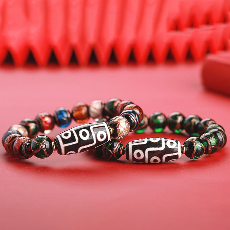 Armband – Wohlstand Balance mit Tigerauge Perlen und Dzi Auge Perlen.