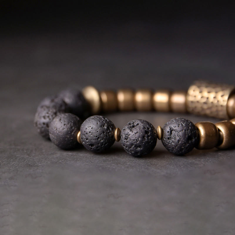 Armband Obsidian Kupfer mit schwarzen Steinen und Metallperlen elegant.