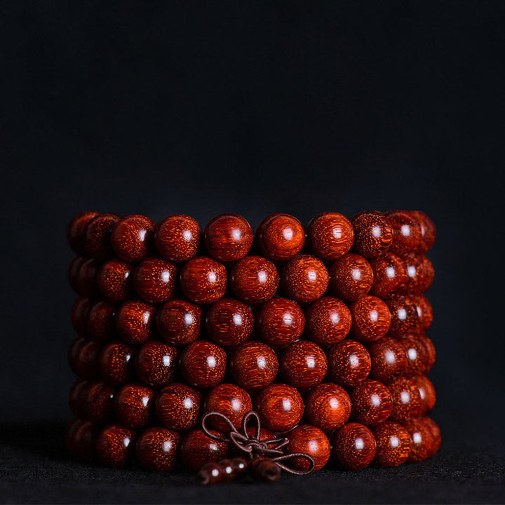 Armband Sandelholz – Balance Energie rote Perlen glänzend elastisch.