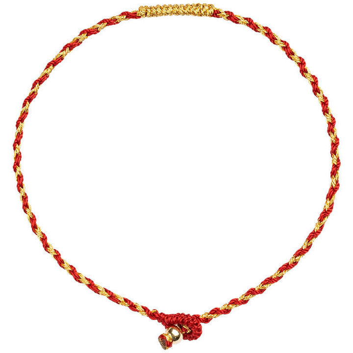 Rotes und goldenes geflochtenes Armband mit Knoten Glück
