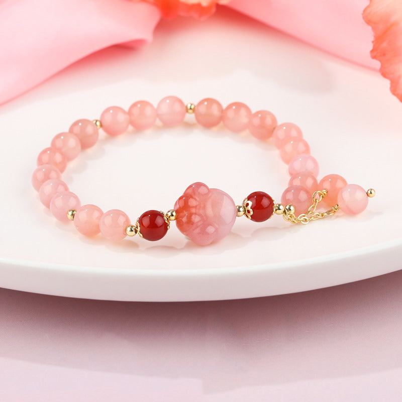 Rosenquarz Armband mit roten Achat Perlen elegant gestylt
