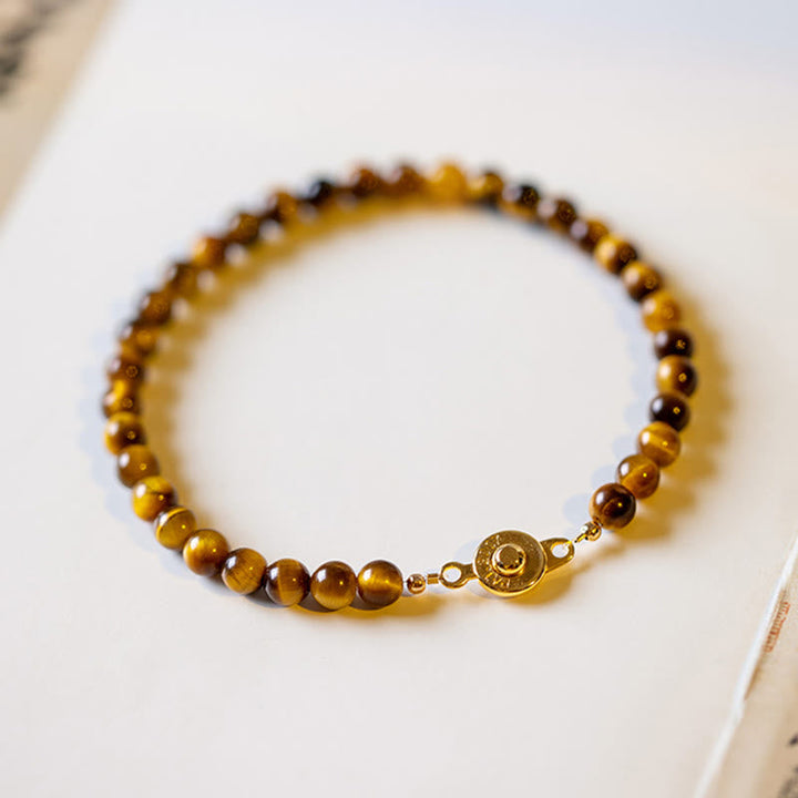 Armband Tigerauge – Schutz & Mut braune Perlen Goldverschluss Flat Lay