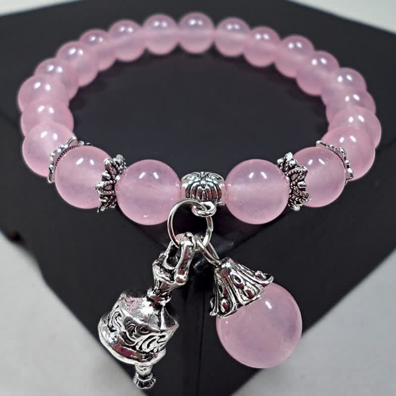 Roséquarz Armband Kristall – Energie mit silbernen Verzierungen eleganz.