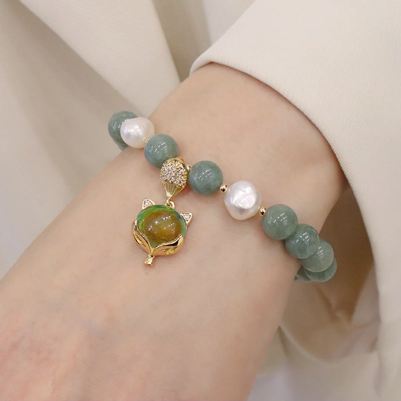 Armband Perle Jade Fuchs Glück grüne Steine elastisch elegant getragen