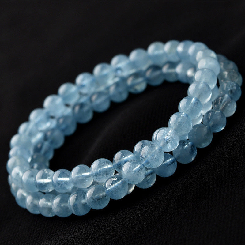 Armband Aquamarin – Heilung & Frieden hellblaue Perlen elastisch getragen