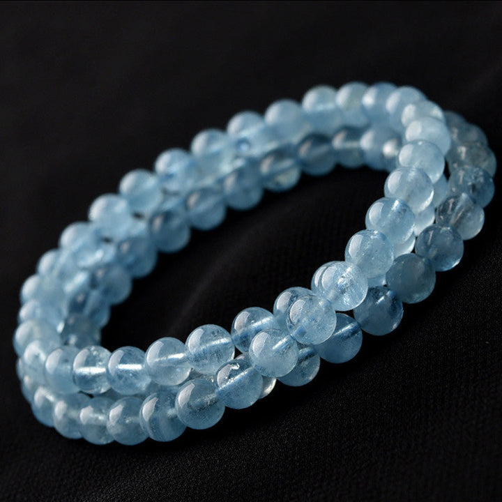 Armband Aquamarin – Heilung & Frieden hellblaue Perlen elastisch getragen