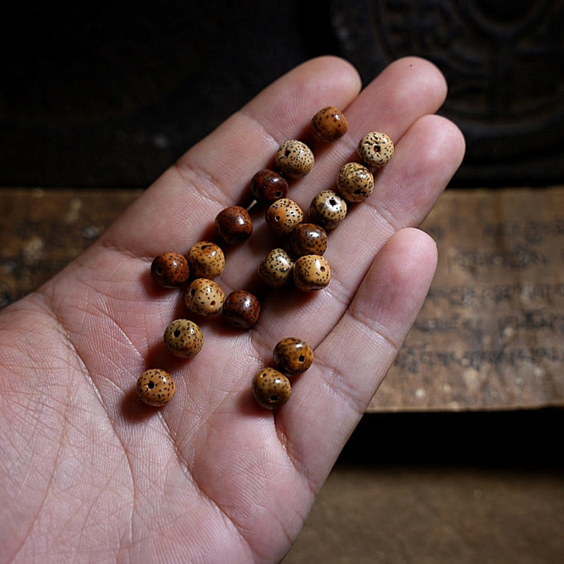 Bodhi Samen Armband Achat Wohlstand Naturstein Handgelenk getragen