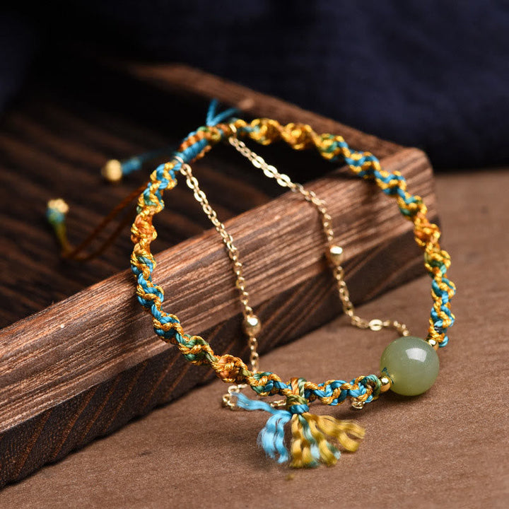 Armband Jade – Glück & Fülle Stärke, blaugelb geflochten mit Naturstein.