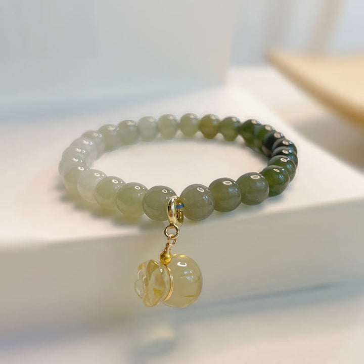 Jade Armband grüne Perlen mit goldenem Anhänger elegant