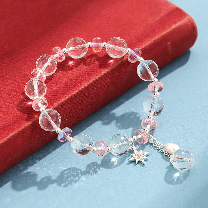 Armband Weißer Kristall Stern – Schutz mit glänzenden Perlen und Charme.
