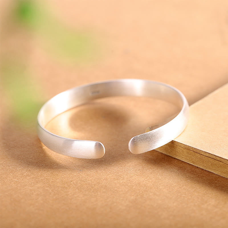 Silbernes Armband 925er glänzend offen minimalistisches Design Naturstein.