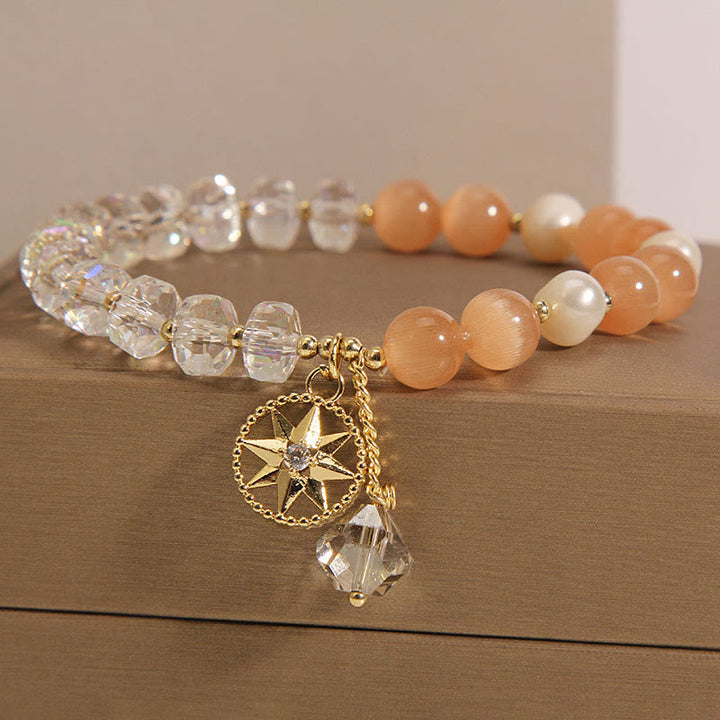 Armband Weißer Kristall Stern mit Pfirsichstein und Perlen elegant.