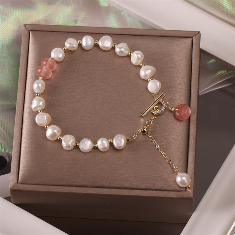 Armband Erdbeerquarz Perle Heilung Energie elegantes Design goldene Details