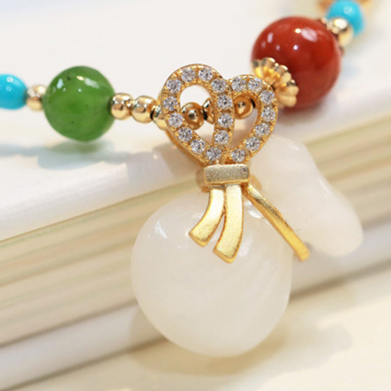 Armband Weiße Jade Segen mit bunten Natursteinen Perlen elegant.
