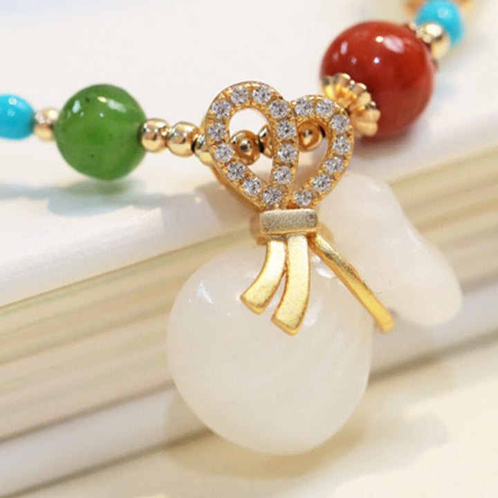 Armband Weiße Jade Segen mit bunten Natursteinen Perlen elegant.
