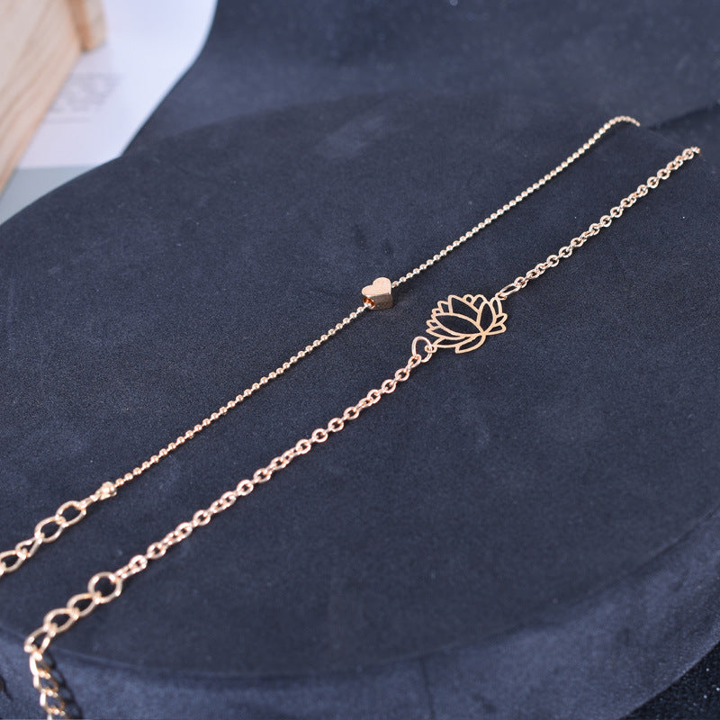 Rosegold Armband Lotus – Liebe mit Herzstein und Lotusblüte Anhänger
