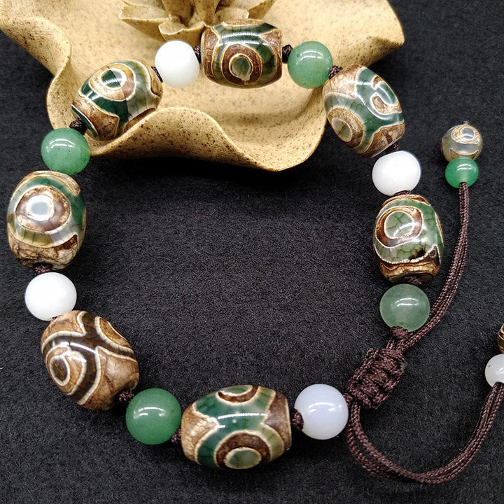Armband Dzi Perle grün weiß bronze Naturstein elastisch Schutz Glück