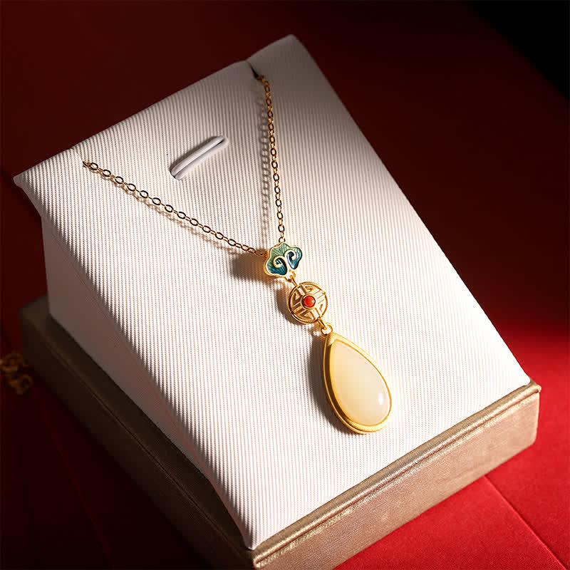 Goldenes Anhänger-Halskette mit Jade-Tropfen und blauen Kristallen Schmuck.
