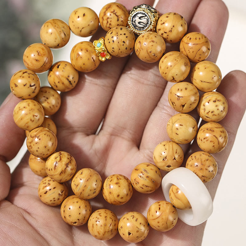 Bodhi Armband Wohlstand Balance Naturstein braun elastisch Handgelenk getragen
