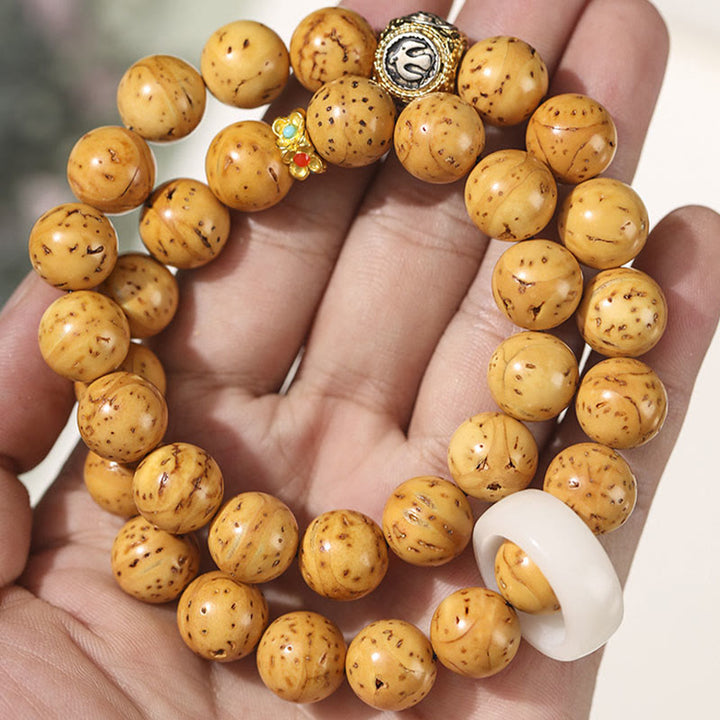 Bodhi Armband Wohlstand Balance Naturstein braun elastisch Handgelenk getragen