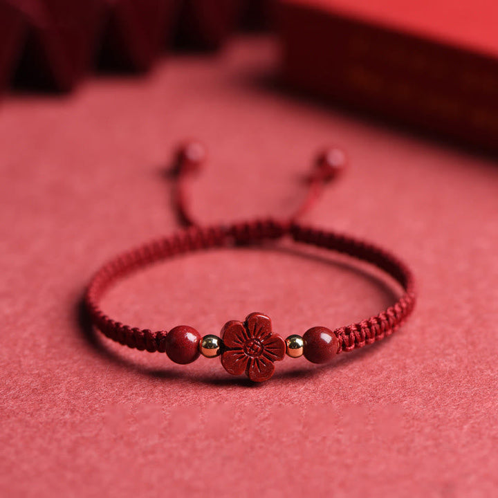 Armband Zinnober Kleeblatt Liebe Segen Energie rote Blume geflochten