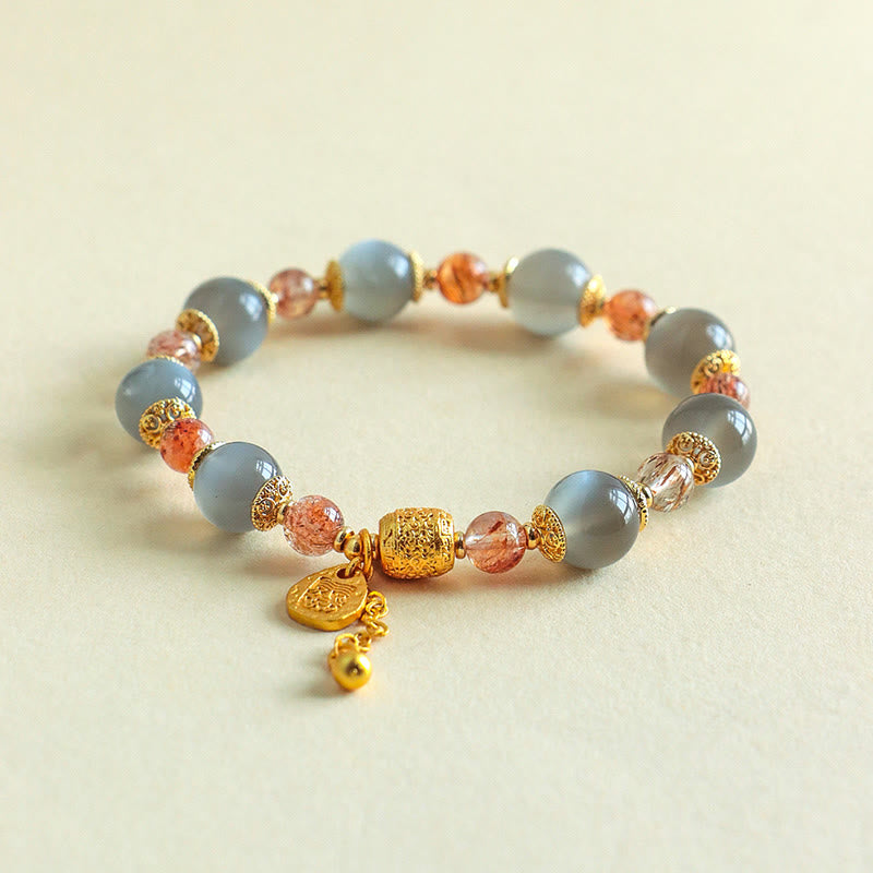 Armband Erdbeerquarz Mondstein Mond Heilung Positivität goldene Perlen Anhänger