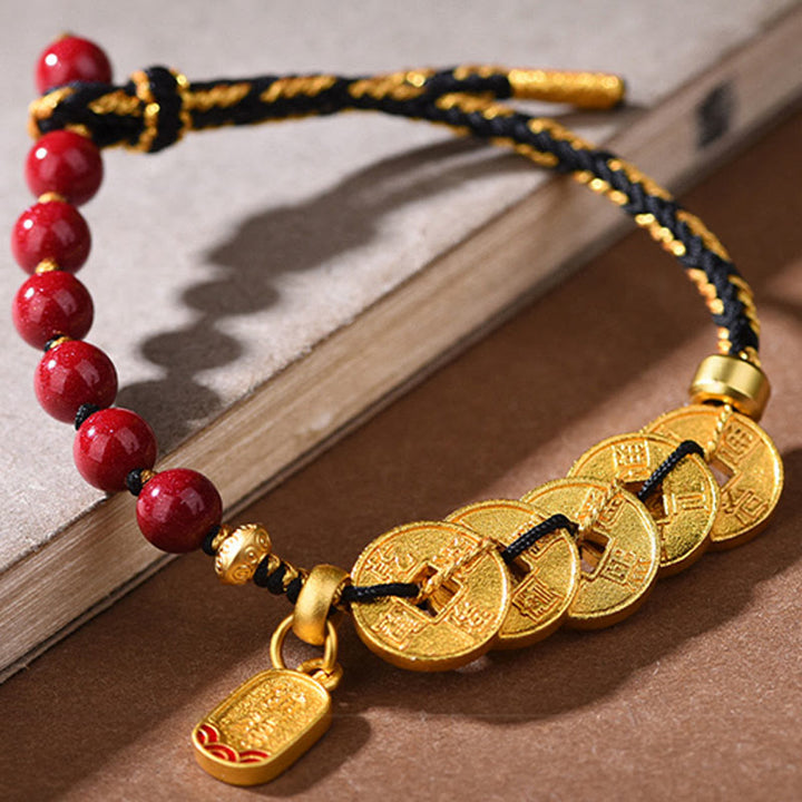 Armband Amethyst Zinnober Balance Glück mit goldenen Münzen rote Perlen