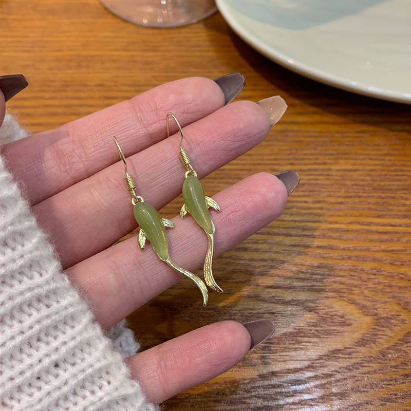 Ohrringe Jade Fisch Glück getragen Hand Boho Schmuck spirituell Ohrhänger