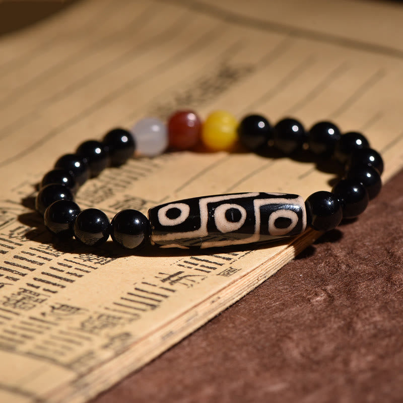 Armband – Wohlstand Energie schwarze Perlen Naturstein elastisch Glücksbringer