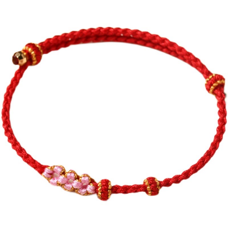 Rotes Armband Pfirsichblüte – Schutz mit rosa Perlen elastisch