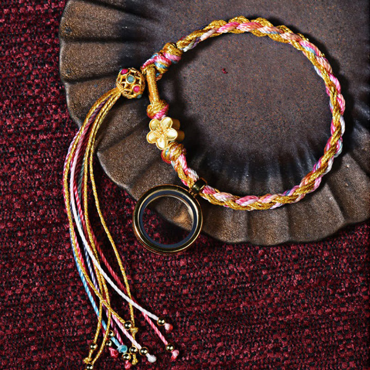 Tibetisches Glück Armband bunt mit Blumenstein und Quasten elastisch.