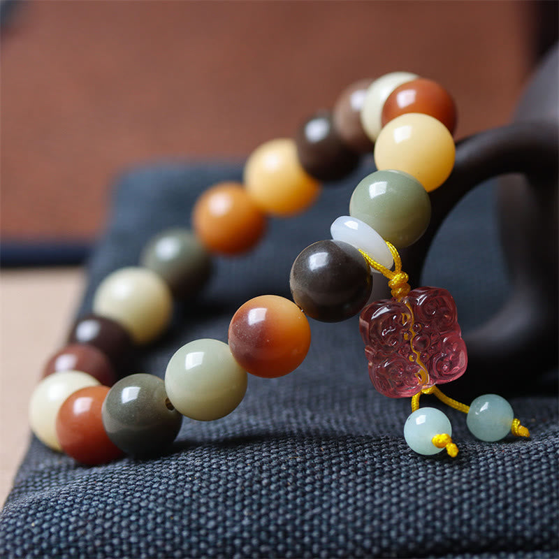 Bodhi Armband Naturstein Perlen Rot Grün Weiß elastisch Friedensarmband