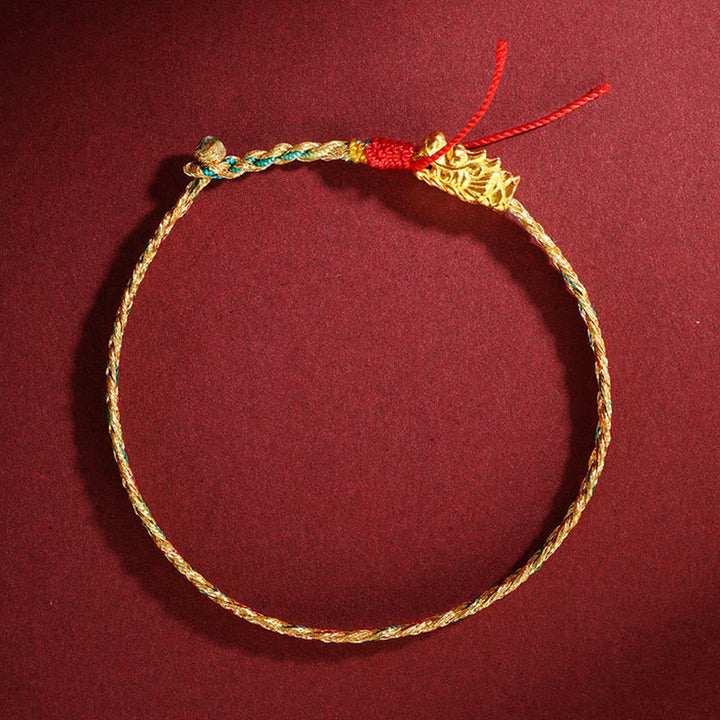 Goldenes Armband Drachen – Erfolg mit roter Kordel Verschluss