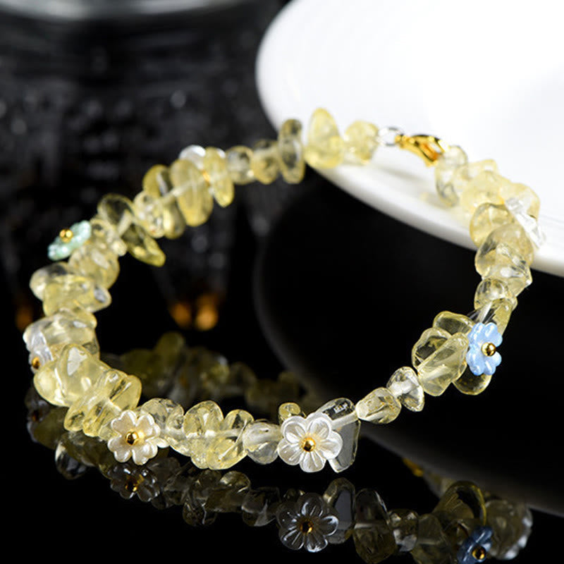 Armband Erdbeerquarz Aquamarin mit Blütenperlen zarter Schmuck Handgelenk elegant