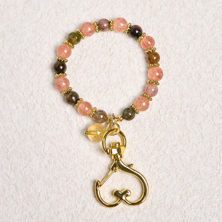 Schlüsselanhänger Erdbeerquarz Citrin Positivität Herz goldener Karabiner spiritueller Glücksbringer