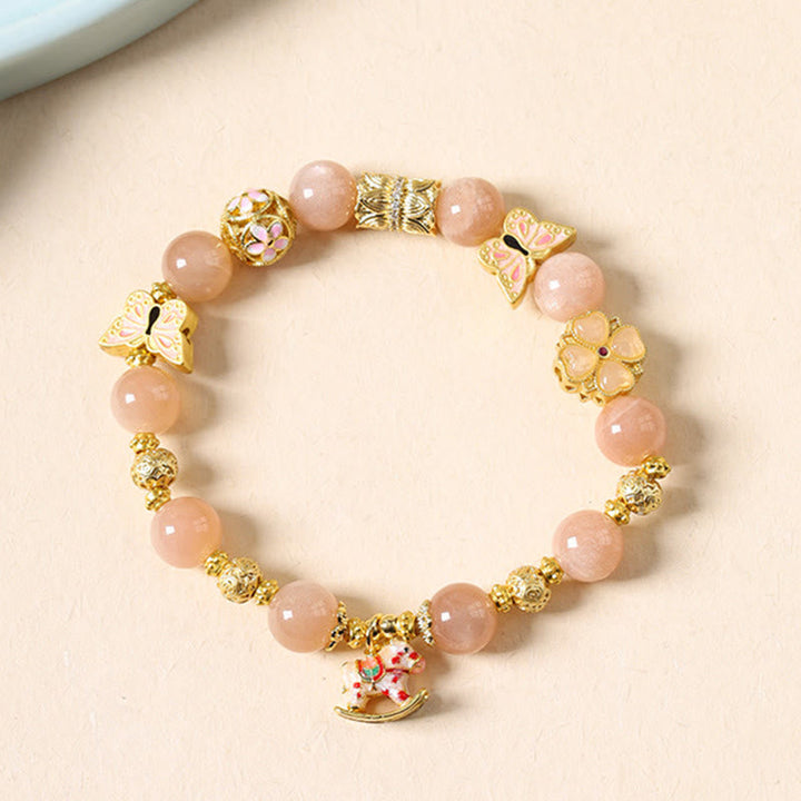 Armband Turmalin Roter Achat Erfolg rosa Perlen Schmetterling Blume Schaukelpferd Anhänger