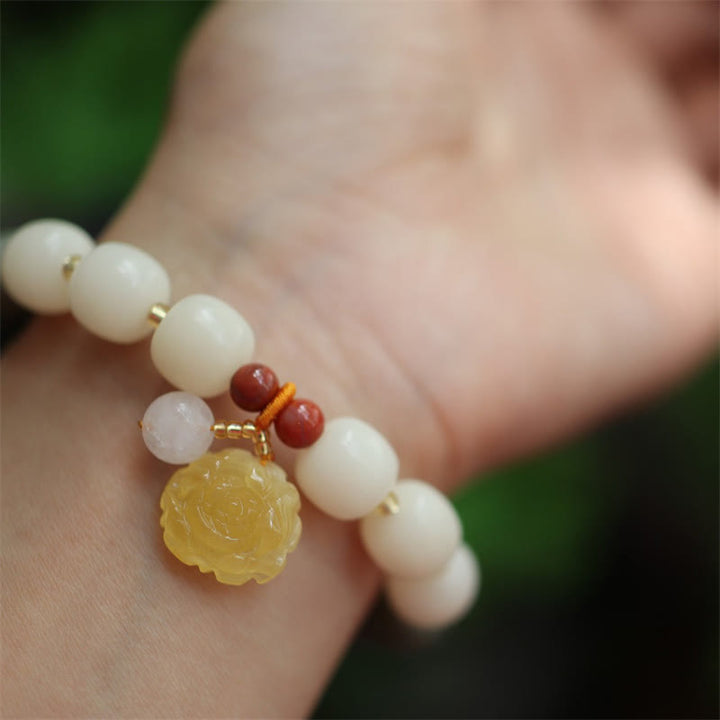 Bodhi Lotus Armband mit Mondstein Perlen Gelbgold Anhänger Handgelenk