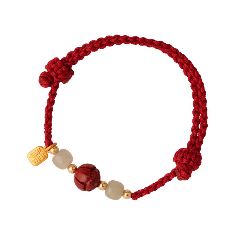 Rotes Armband Zinnober Jade Lotus elastisch Naturstein Goldperlen