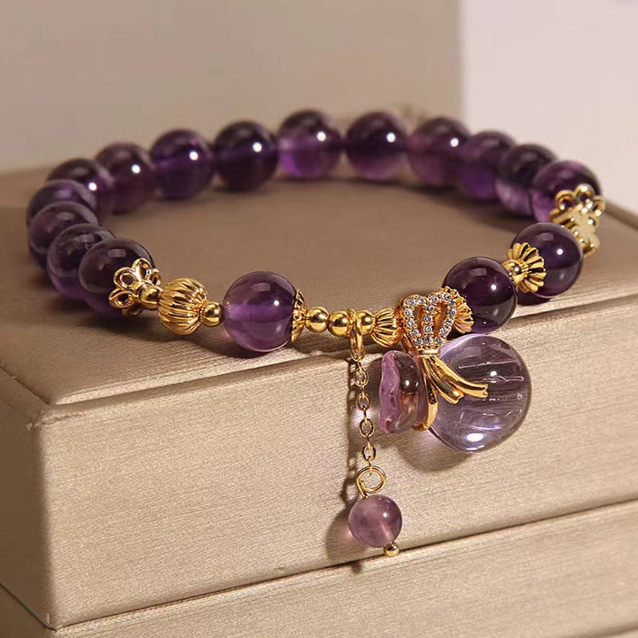 Armband Amethyst Kristall lila Perlen gold Charm elegant Schmuck