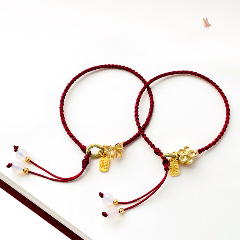 Rotes Armband Pfirsichblüte – Glück Energie mit goldenen Charms, Paar.