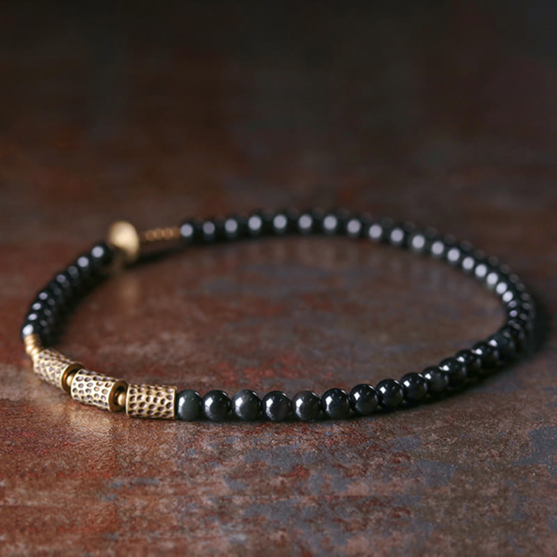 Armband Obsidian Kupfer – Liebe schwarze Perlen goldene Akzente elegant