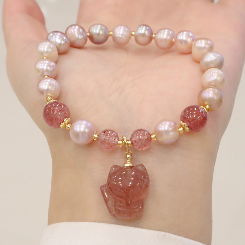 Armband Erdbeerquarz Perle Fuchs rosa Perlen elastisch Handgelenk getragen