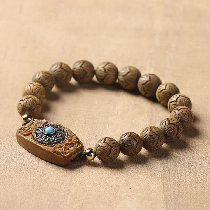 Sandelholz Ebenholz Armband Om Mani Padme Hum mit geschnitzten Perlen elegant