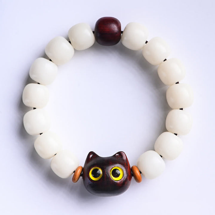 Armband Sandelholz Bodhi Katze Glück weiße Perlen dunkelbraun