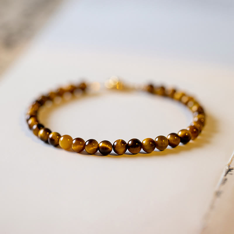 Armband Tigerauge – Schutz & Mut braune Perlen Nahaufnahme Flatlays