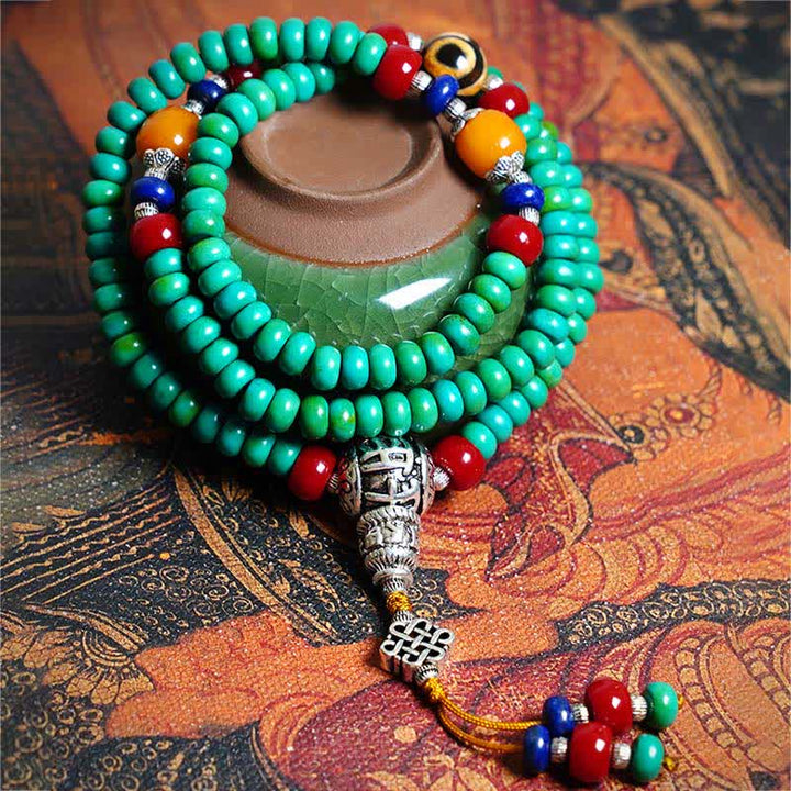 Mala 108 Perlen Türkis Schutz Armband mit silbernen Verzierungen