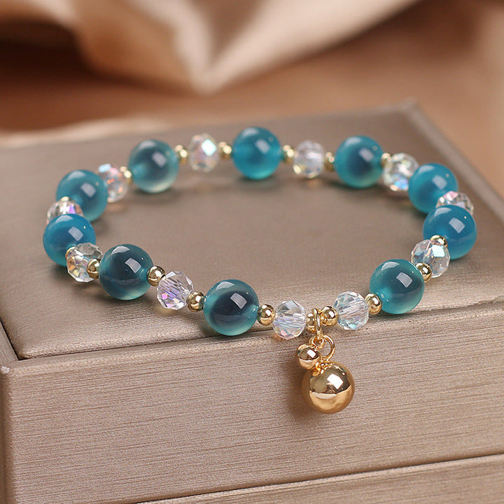 Achat Armband mit türkisen Steinen und Kristallperlen elegant.